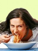 Woman_eating_with_angry_look